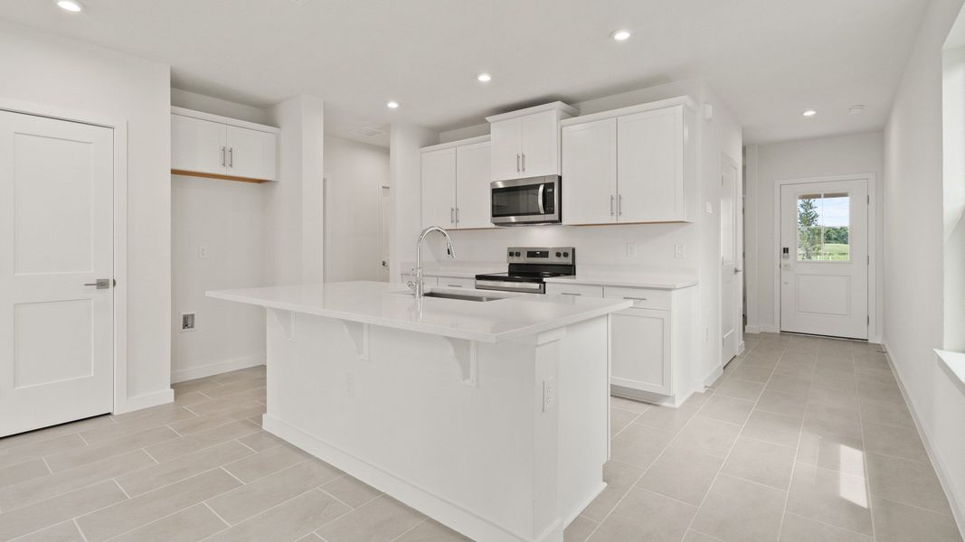 Kitchen and storage space in the Flagler by DRB Homes in Hamilton Bluff. Kitchen and storage space in the Flagler by DRB Homes in Hamilton Bluff.