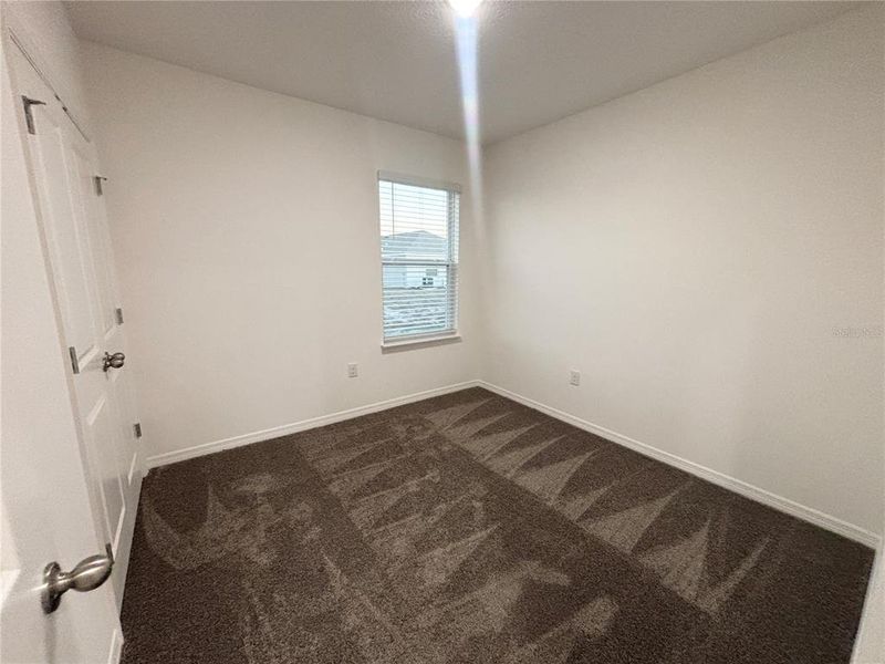 Spacious, unfurnished interior of a new home in Lake Deer Estates, Poinciana (Image 11).