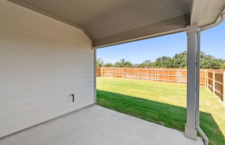 Exterior details and patio area of a home in Saddleback at Santa Rita Ranch, Liberty Hill (Image 3). Exterior details and patio area of a home in Saddleback at Santa Rita Ranch, Liberty Hill (Image 3).