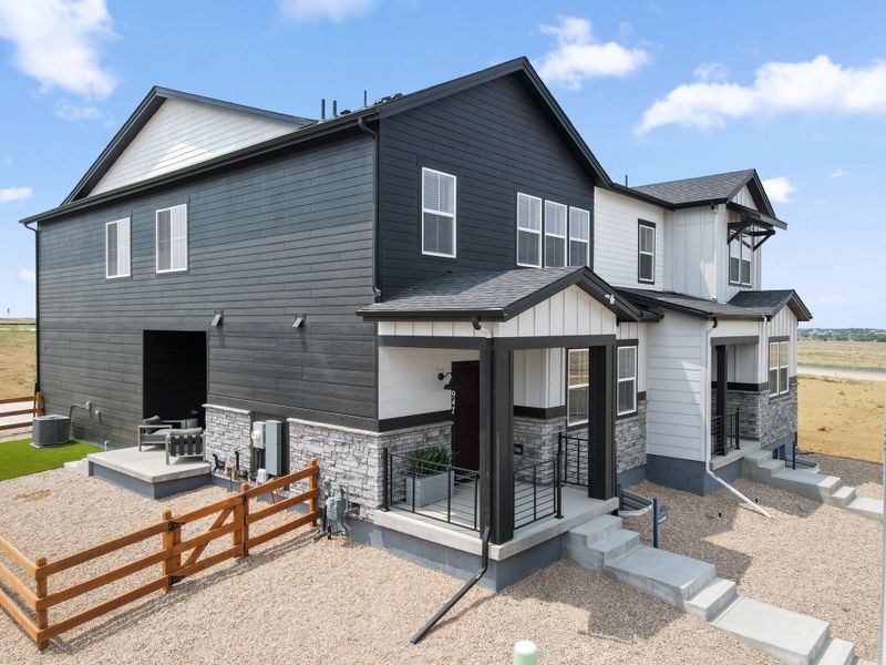 Representative exterior details of a home built from the 2503 by Risewell Homes in Harvest Crossing, Aurora (Image 4).