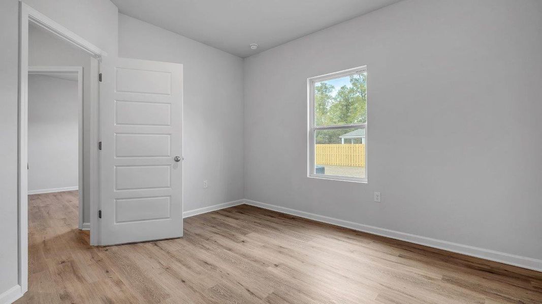 Representative unfurnished interior of a home built from the The Mckenzie by D.R. Horton in Greystone, Crawfordville (Image 18).