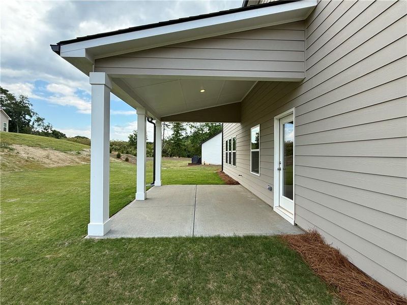 Exterior details and patio area of a home in Ponderosa Farms Estates, Gainesville (Image 4). Exterior details and patio area of a home in Ponderosa Farms Estates, Gainesville (Image 4).