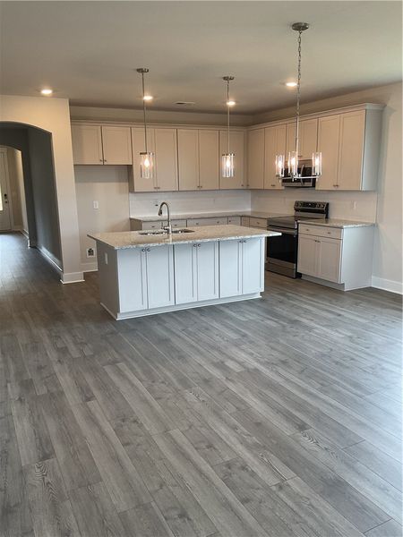 Large island with storage on the front of the island as well