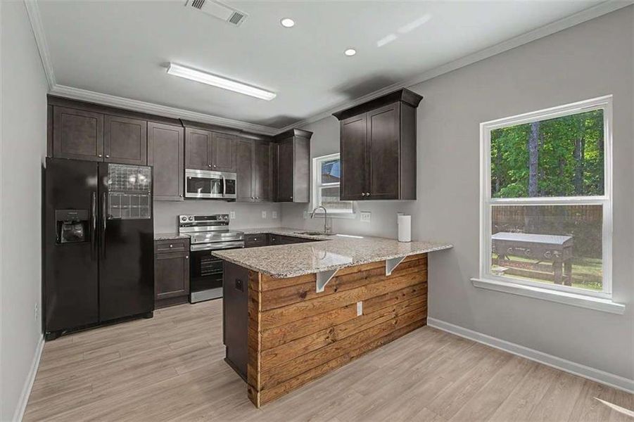 Furnished interior view inside a new home in Traditions at Cedarcrest, Dallas (Image 8).