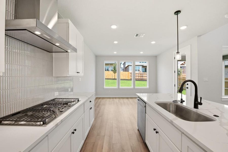 Furnished interior view inside a new home in Heritage, Dripping Springs (Image 5).