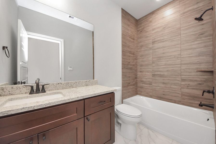 Furnished interior view inside a new home in Hill & Dale Ranch, Splendora (Image 8).