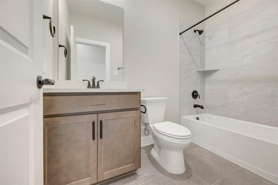 Furnished interior view inside a new home in Pomona - Grove Row Collection, Manvel (Image 4).