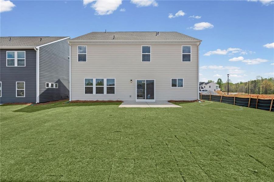 Exterior details and patio area of a home in Twin Lakes, Hoschton (Image 4).