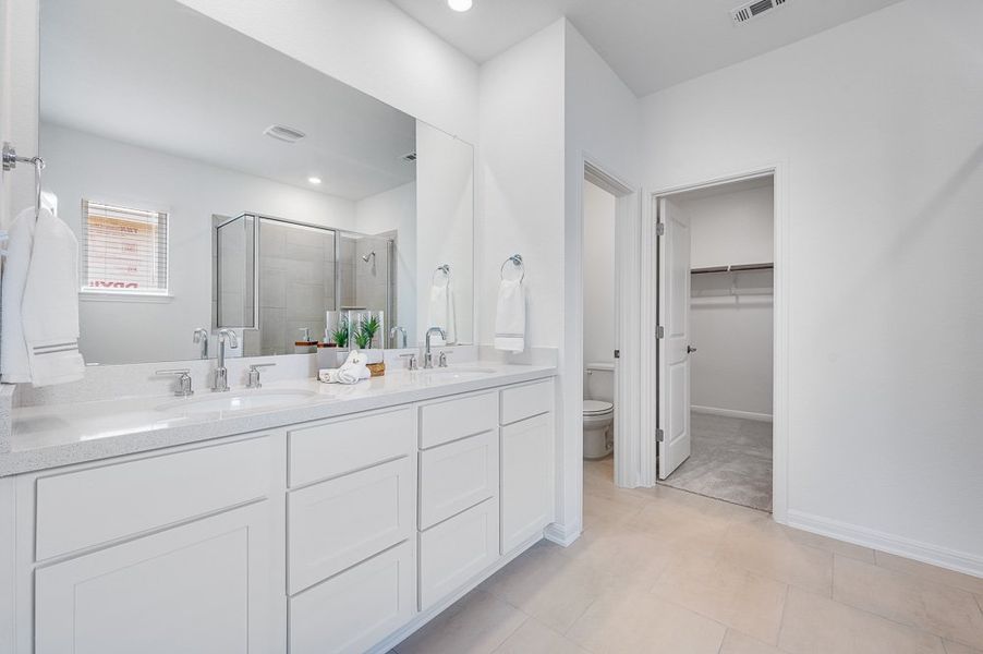 Representative furnished interior of a home built from the Sparrow by Taylor Morrison in Turner's Crossing 50s, Austin (Image 12).