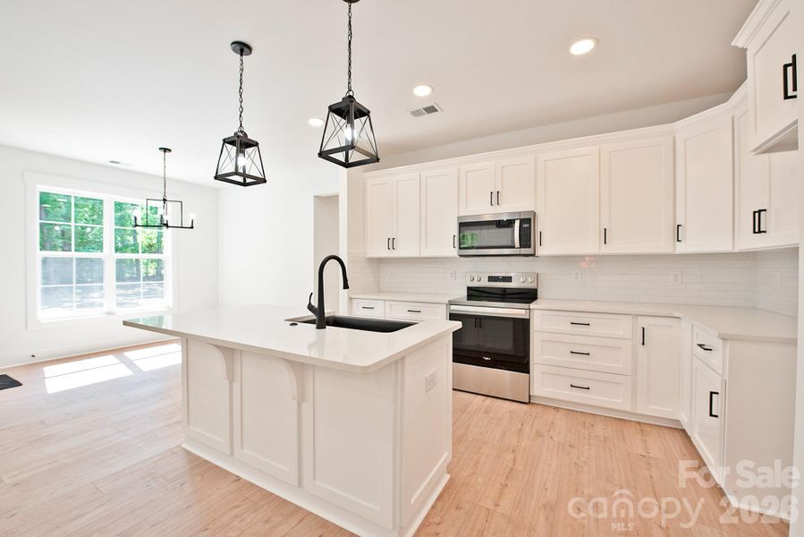 Furnished interior view inside a new home in , Concord (Image 12).