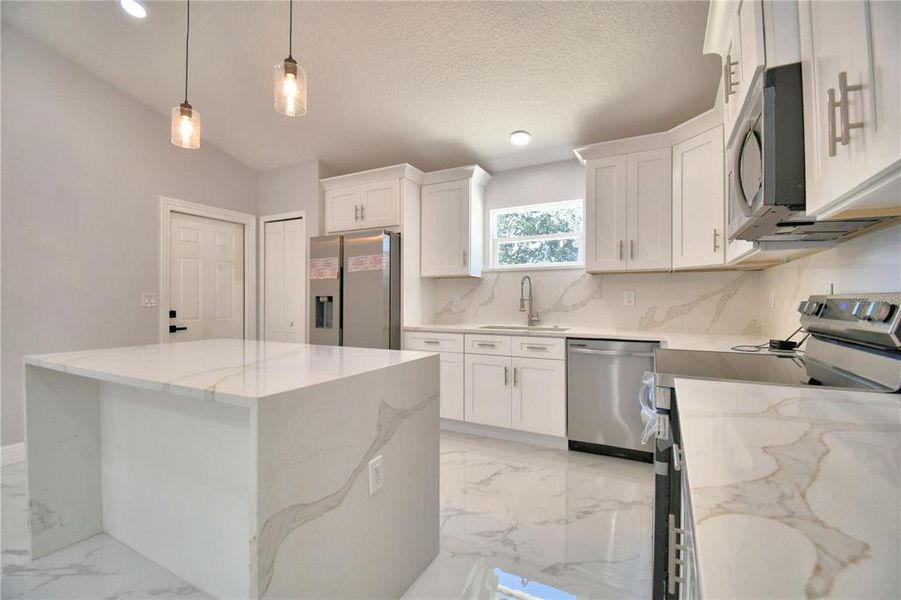 Furnished interior view inside a new home in , Poinciana (Image 11). Furnished interior view inside a new home in , Poinciana (Image 11).