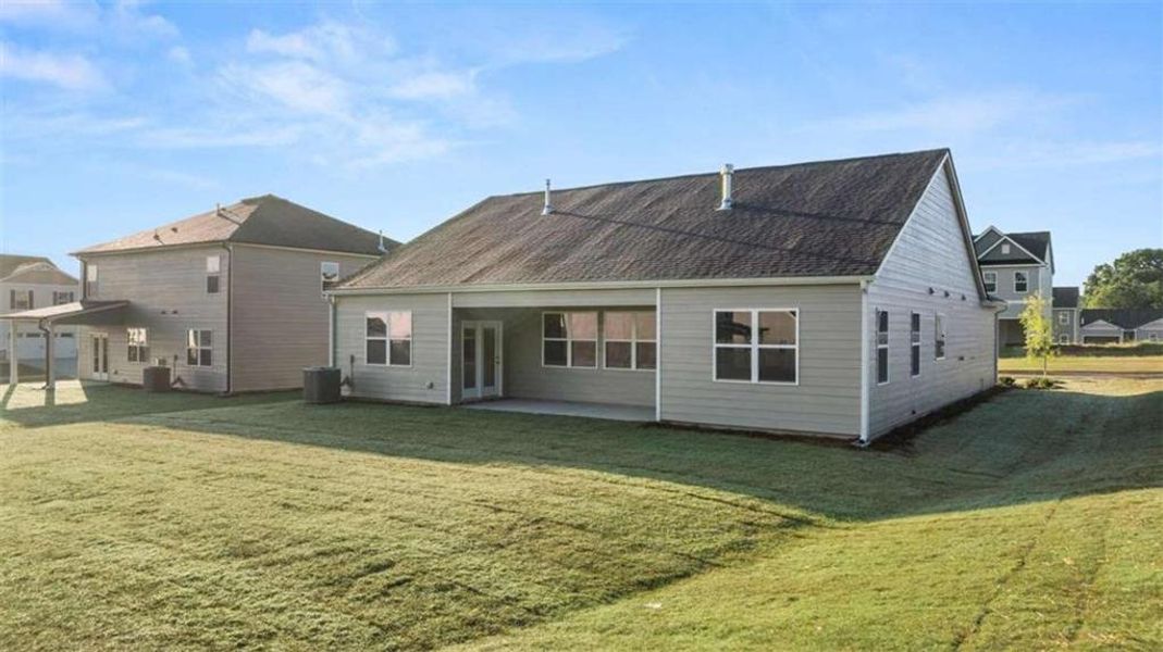 Exterior details and patio area of a home in Preserve at Dove Creek, Statham (Image 30).