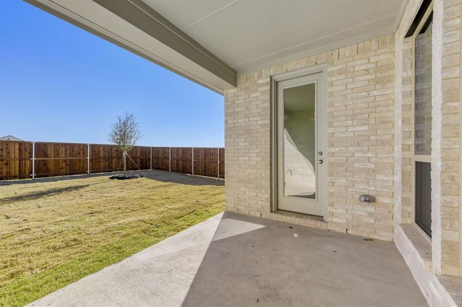 Exterior details and patio area of a home in Wellington, Haslet (Image 4).