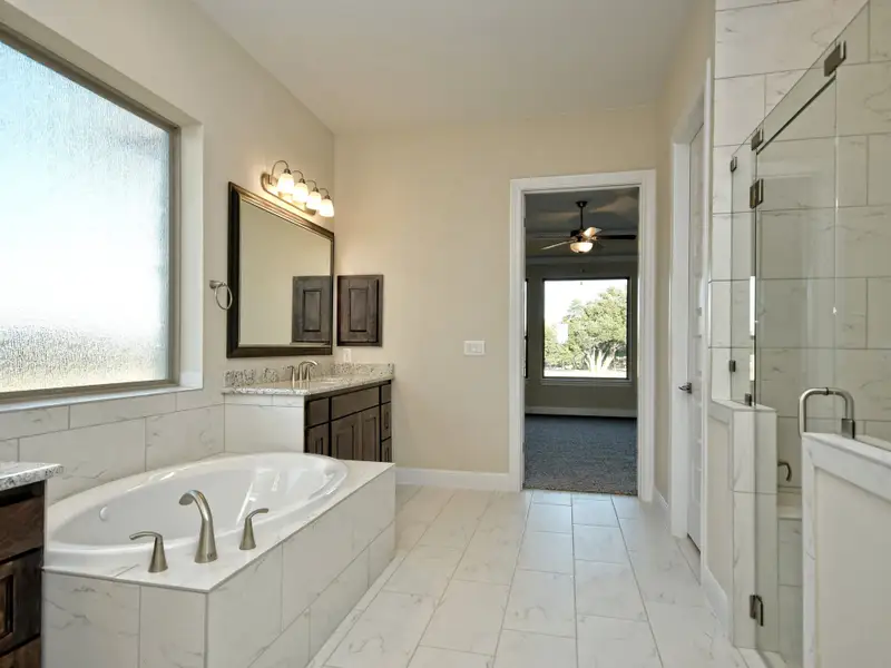 Representative furnished interior of a home built from the Santa Barbara II by Giddens Homes in Scofield Farms Estates, Georgetown (Image 18).