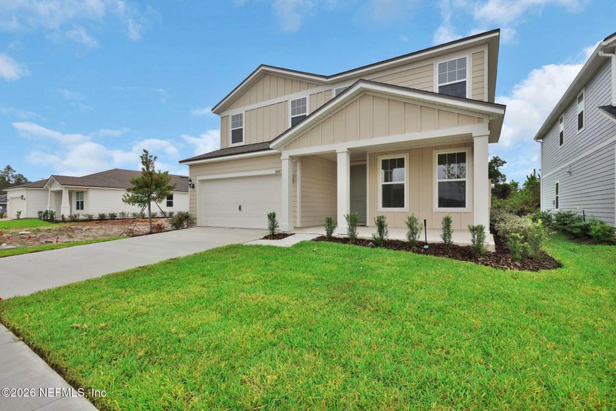 Front exterior of a new home in Hyland Trail, Green Cove Springs, FL, highlighting curb appeal (Image 23).