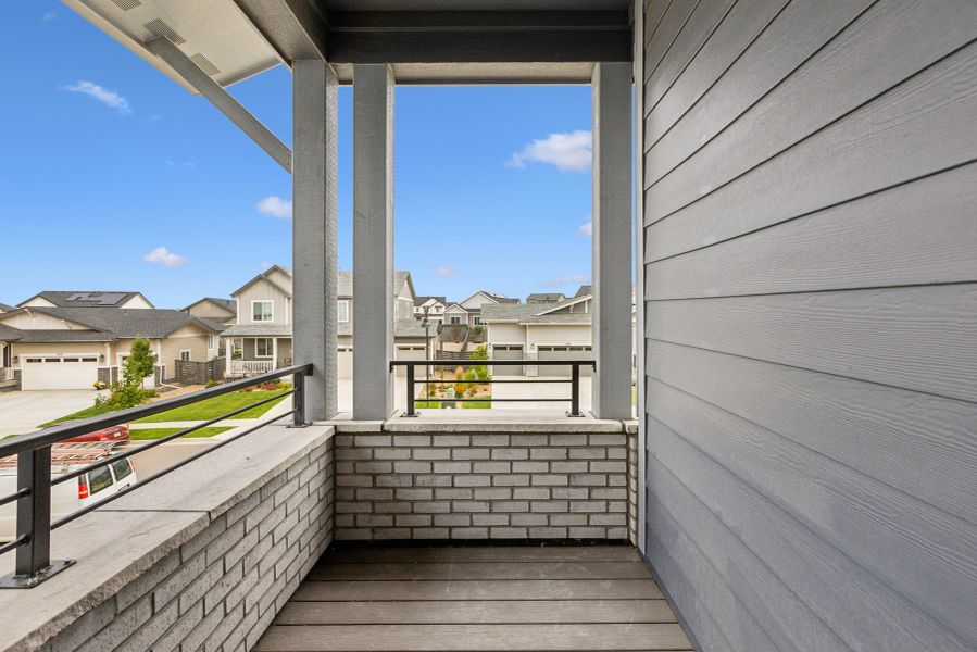 Exterior details and patio area of a home in Kinston Mainstreet Townhomes, Loveland (Image 4). Exterior details and patio area of a home in Kinston Mainstreet Townhomes, Loveland (Image 4).