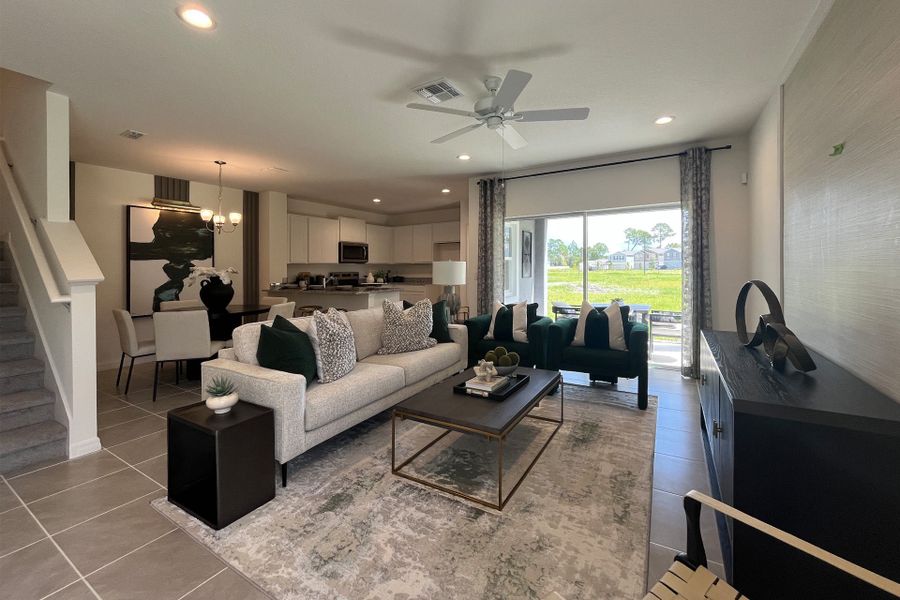 Ashley townhome model in Pine Meadows, Eustis FL — elegant two-story home with 4 bedrooms, 3 baths, and 1,898 sq. ft. of living space. Featuring an open-concept kitchen, dining, and living area, this modern townhome offers flexible layouts for families, guests, or a home office. Highlights include a spacious primary suite with private bath, second-floor laundry, covered lanai, and welcoming entry porch. Built with energy efficiency and stylish design, the Ashley townhome blends comfort, functionality, and charm in a sought-after Central Florida community.