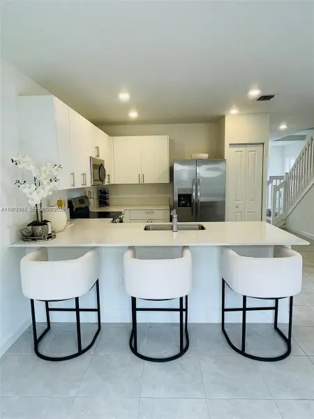 Furnished interior view inside a new home in , Pembroke Park (Image 3).