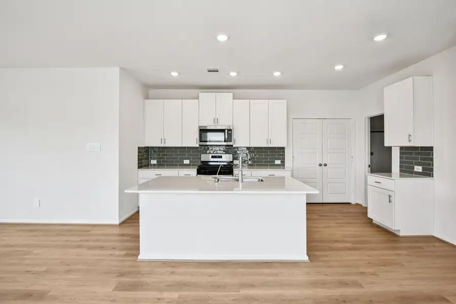 Furnished interior view inside a new home in Landing Meadows - Traditional Series, New Caney (Image 7).