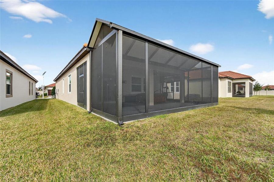 Exterior details and patio area of a home in Southshore Bay: The Estates, Wimauma (Image 36).