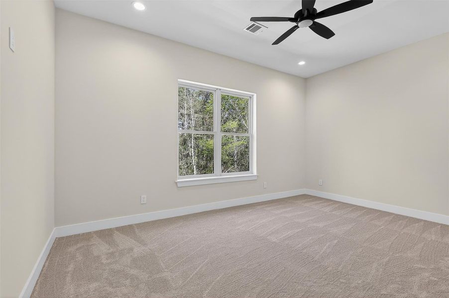 Bright and airy bedroom, offering comfort and privacy.
