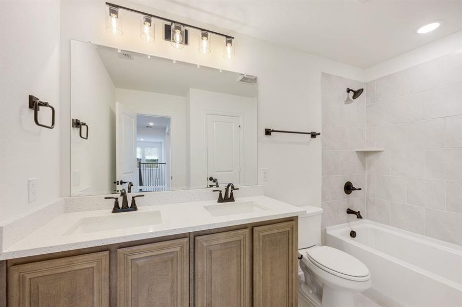 Furnished interior view inside a new home in Wildflower Ranch 60-65, Fort Worth (Image 8). Furnished interior view inside a new home in Wildflower Ranch 60-65, Fort Worth (Image 8).