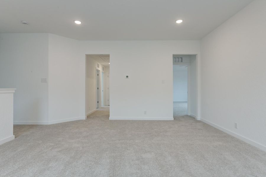 Representative unfurnished interior of a home built from the Alexis by Ashton Woods in Nopal Valley, San Antonio (Image 24).
