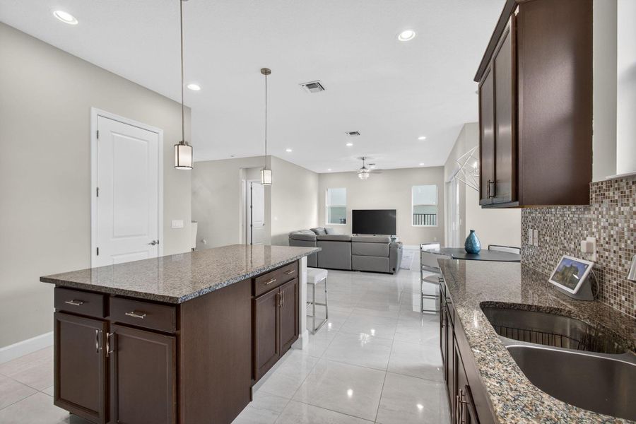 Furnished interior view inside a new home in , The Acreage (Image 36).