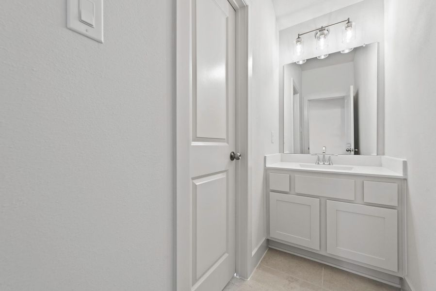 Furnished interior view inside a new home in Bridgeland, Cypress (Image 3).