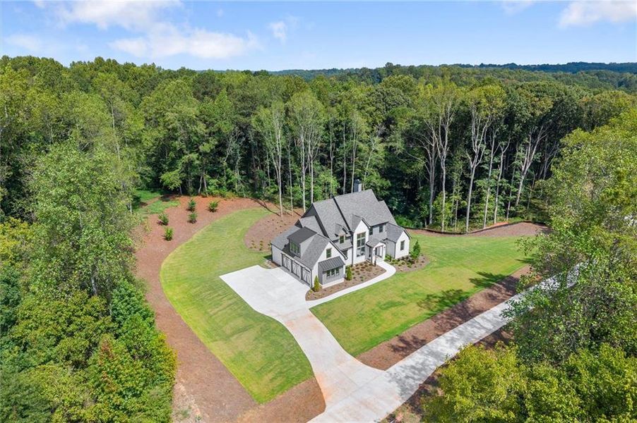 Front exterior of a new home in , Canton, GA, highlighting curb appeal (Image 35).