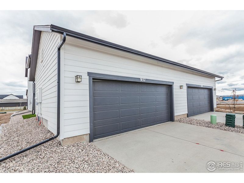 Exterior details and patio area of a home in Prairie Song Story Collection - Single Family Homes, Windsor (Image 23).