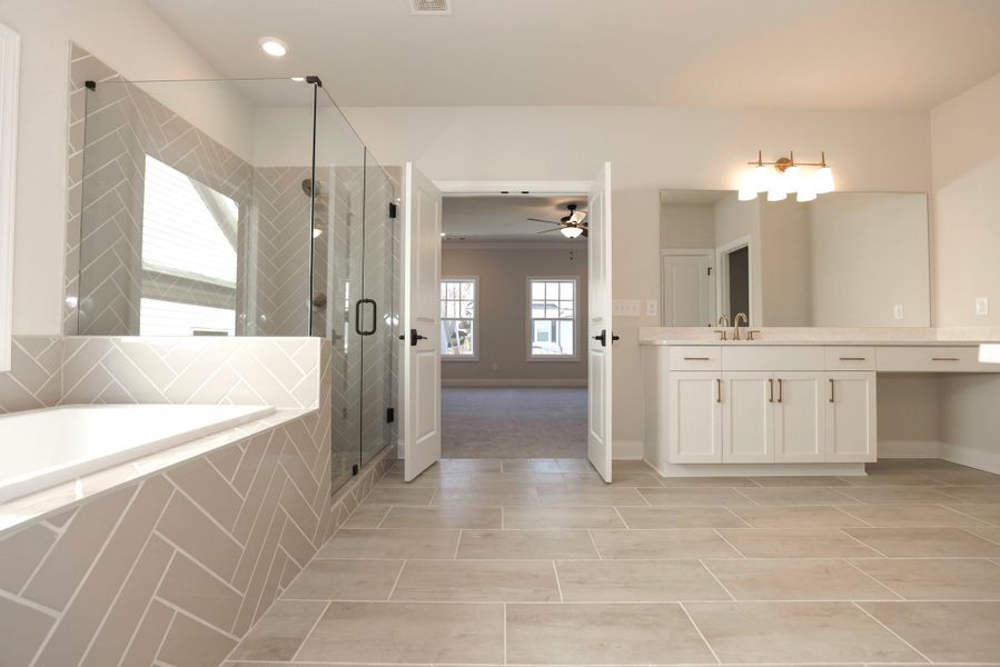 Representative furnished interior of a home built from the The Maddox by The Providence Group in Bellmoore Park, Johns Creek (Image 29).