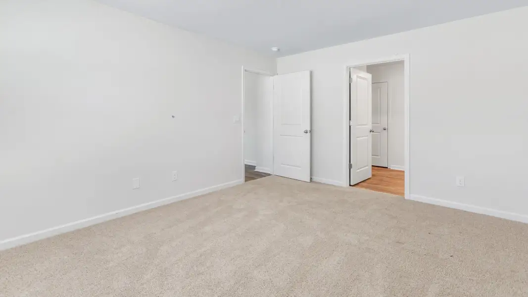 Spacious, unfurnished interior of a new home in Neal Place, Stokesdale (Image 16). Spacious, unfurnished interior of a new home in Neal Place, Stokesdale (Image 16).