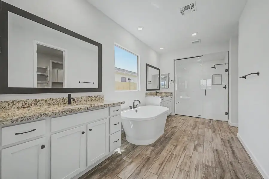 Furnished interior view inside a new home in Forté at Granite Vista, Waddell (Image 9).
