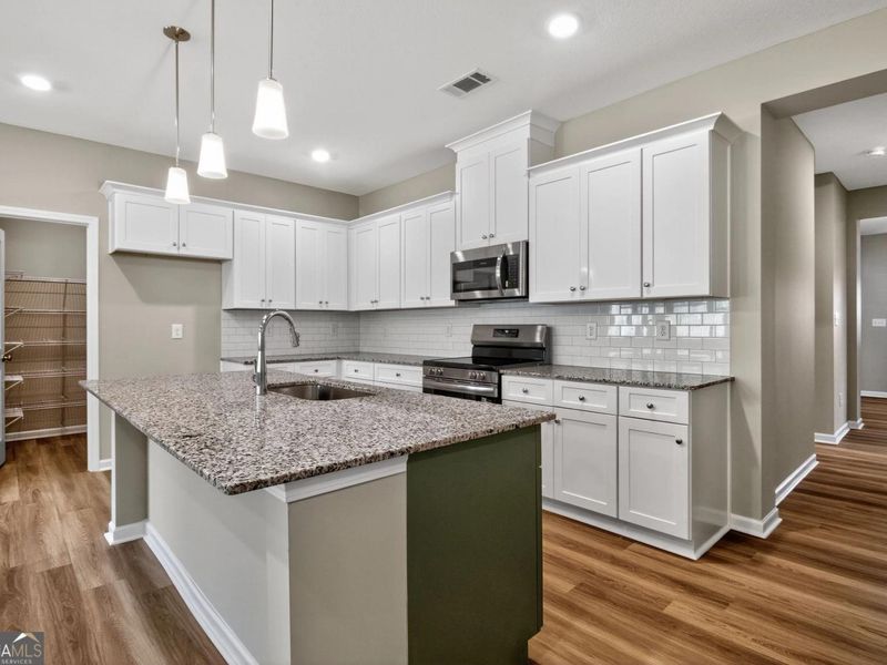 Furnished interior view inside a new home in Ivy Glen, Perry (Image 5).