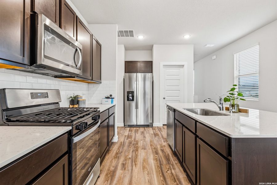 Furnished interior view inside a new home in , San Antonio (Image 11).