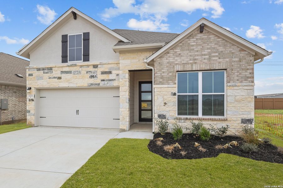 Front exterior of a new home in Sunflower Ridge, New Braunfels, TX, highlighting curb appeal (Image 21).