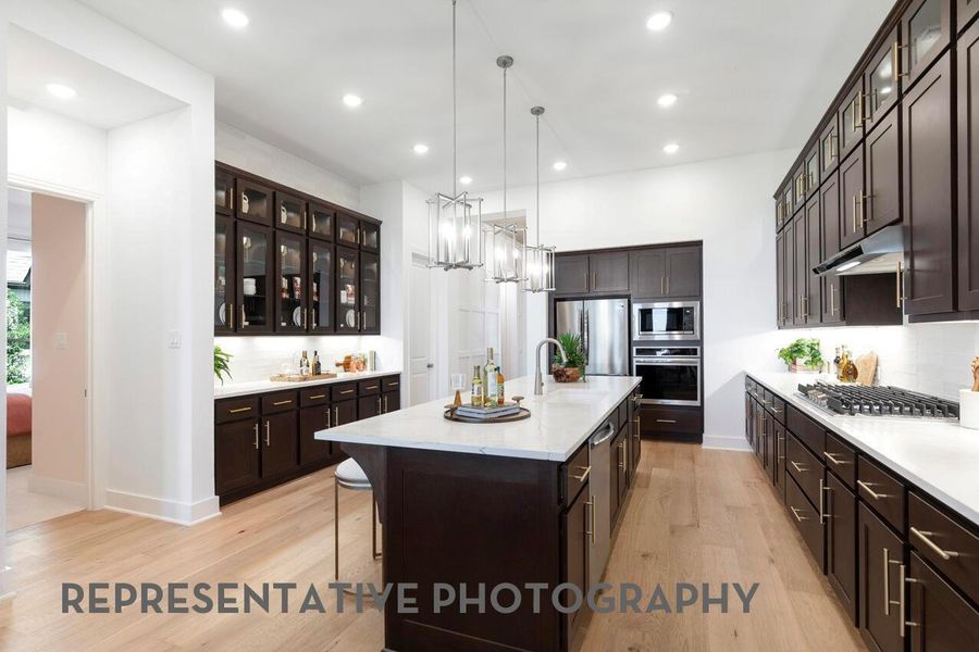 Furnished interior view inside a new home in ARTAVIA, Conroe (Image 6).