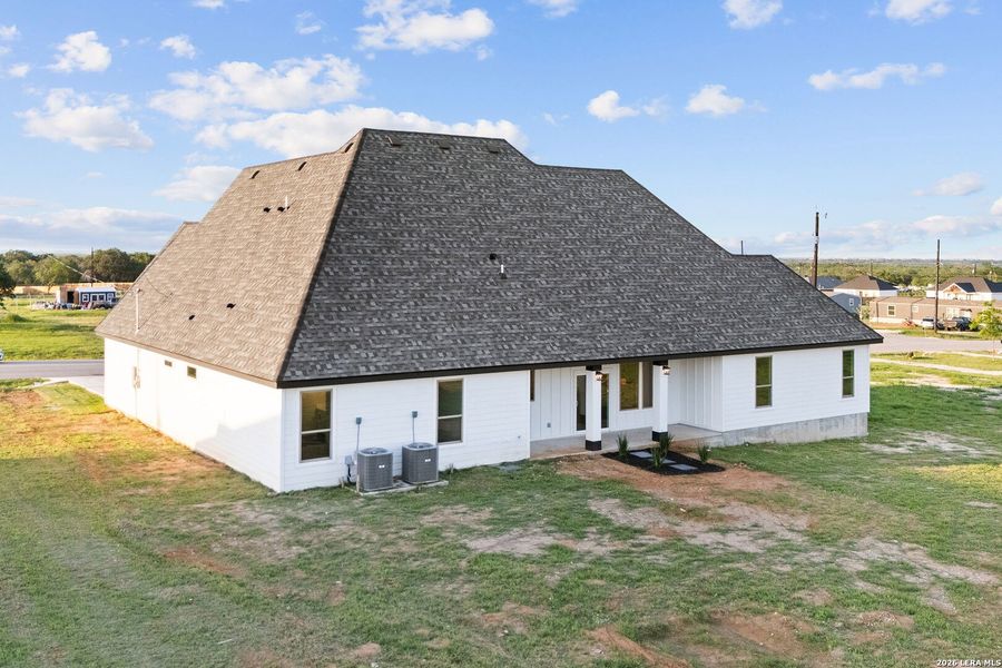 Exterior details and patio area of a home in , Atascosa (Image 3).