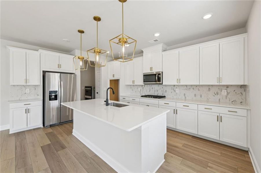 Furnished interior view inside a new home in Vines at Mill Creek - Estate Series, Braselton (Image 16).