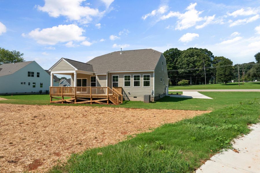 Front exterior of a new home in Redland, Advance, NC, highlighting curb appeal (Image 24). Front exterior of a new home in Redland, Advance, NC, highlighting curb appeal (Image 24).