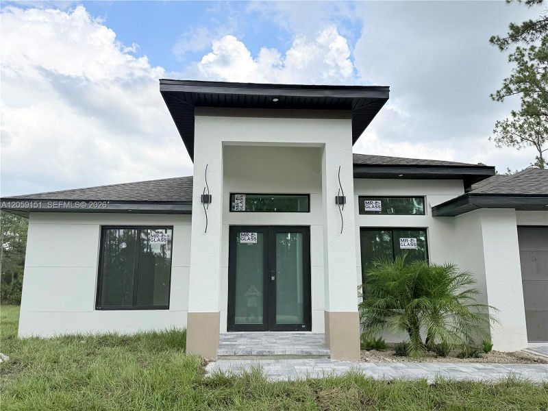 Exterior details and patio area of a home in , Lehigh Acres (Image 3).