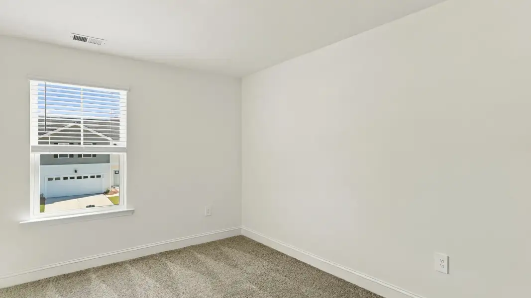 Spacious, unfurnished interior of a new home in The Lakes at North Glynn, Brunswick (Image 19).