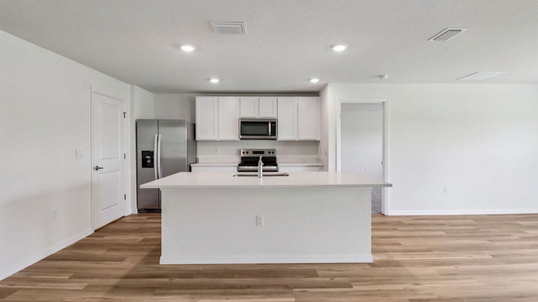 Representative furnished interior of a home built from the Aria by D.R. Horton in Sandal Key, Weeki Wachee (Image 13).