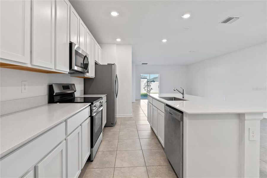 Furnished interior view inside a new home in Storey Creek: Manor Collection, Kissimmee (Image 5).