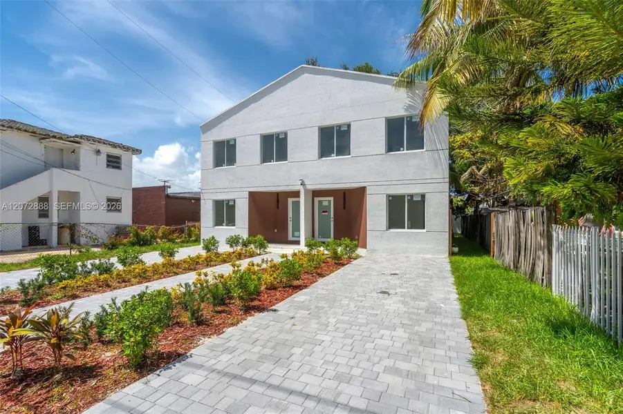 Front exterior of a new home in , Miami, FL, highlighting curb appeal (Image 2). Front exterior of a new home in , Miami, FL, highlighting curb appeal (Image 2).