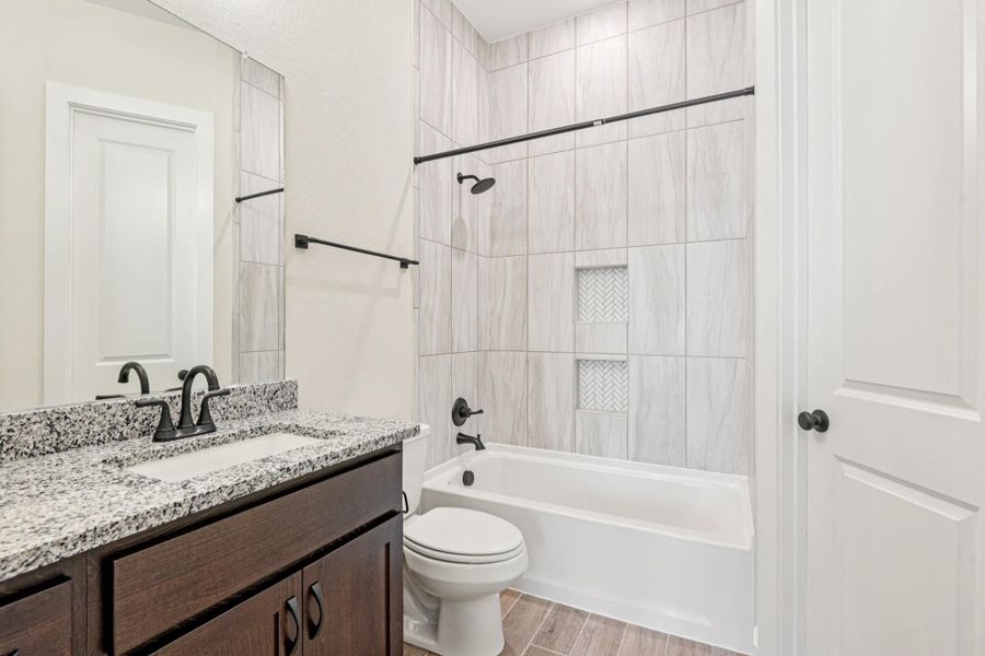 Furnished interior view inside a new home in Village at Three Oaks, Seguin (Image 15). Furnished interior view inside a new home in Village at Three Oaks, Seguin (Image 15).