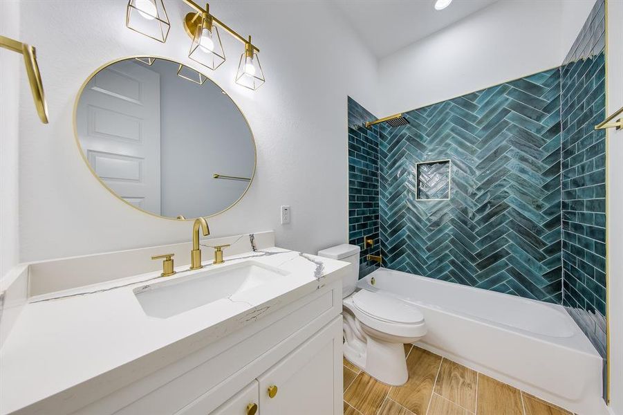 Dive into a refreshing oasis in the bathroom featuring vibrant turquoise tiles. This playful splash of color transforms the space into a cheerful escape, perfect for unwinding after a long day or invigorating your morning routine.