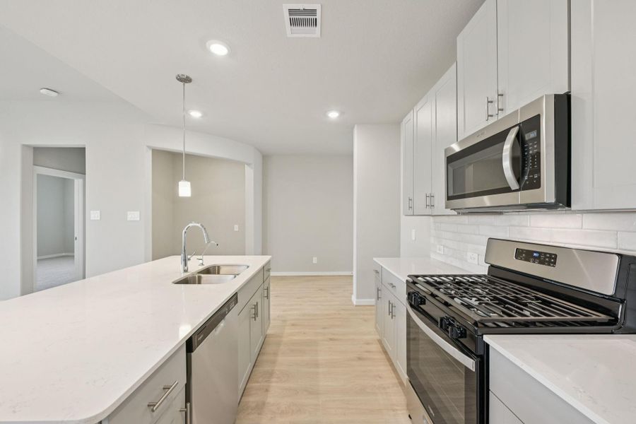 Photo is not of the actual home, but is an inspirational photo of builder’s model home and may depict options, furnishings, and/or decorator features that are not included