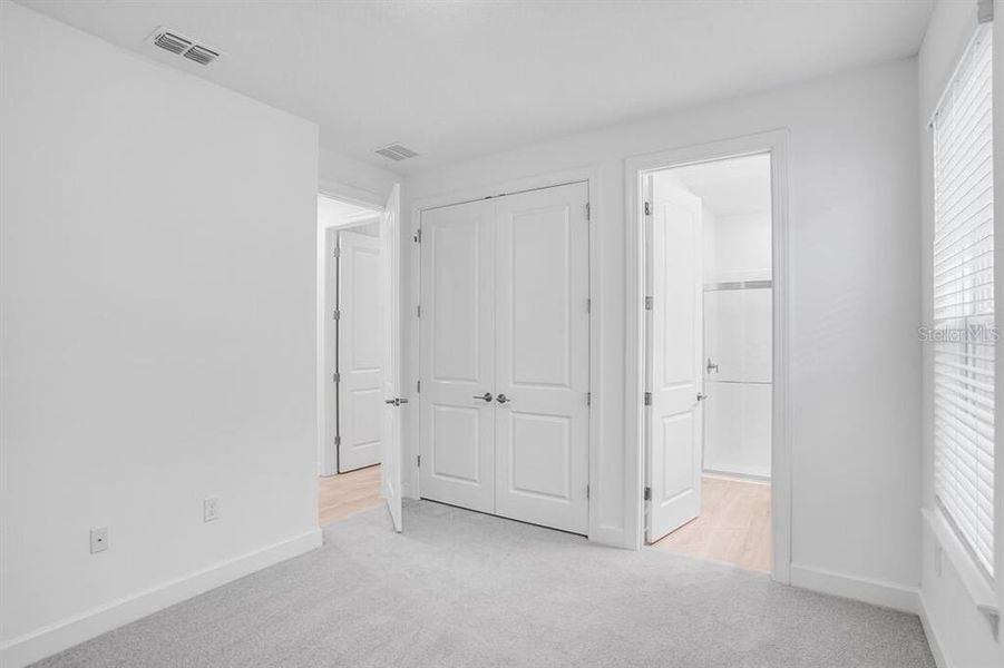 Spacious, unfurnished interior of a new home in Esplanade at Center Lake Ranch, St. Cloud (Image 20).